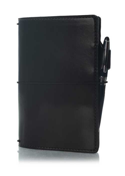 An Austen leather notebook with a closure elastic and pen loop. The collection name is Austen and the color is called Morland (Ebony Black) - ChicSparrow