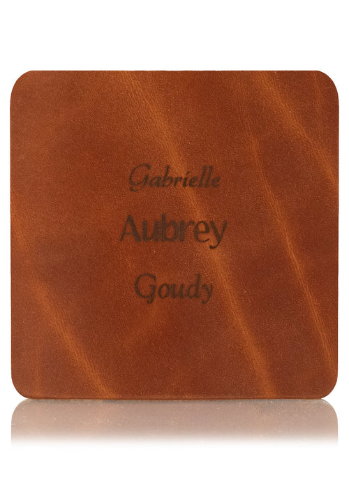 Brown leather sample with inscription text. Choose from 3 different fonts to customize the leather notebook cover.