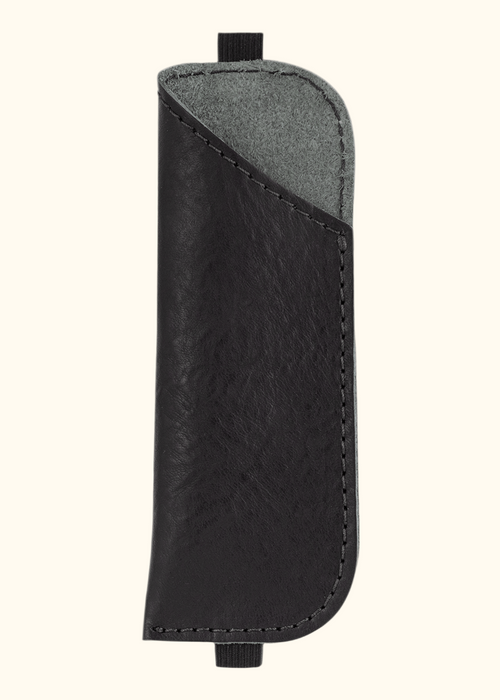 Black leather pen case with elastic strap. Storage for pens and pencils. Made in USA by Chic Sparrow.