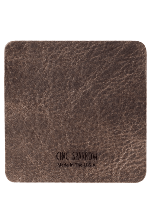 Brown leather sample with Chic Sparrow logo. Square leather sample.