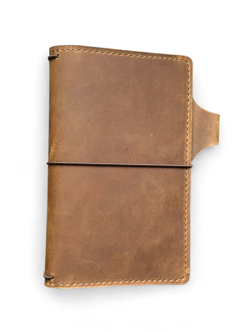Brown leather wallet on a white background