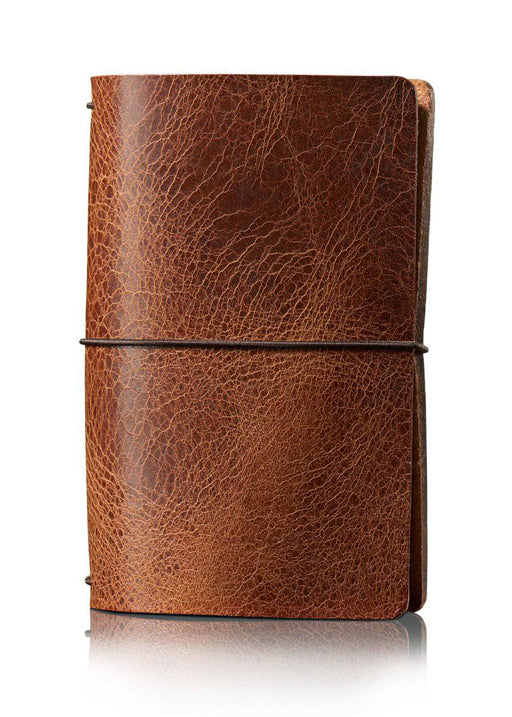 Golden brown Maverick travelers notebook cover. Simple leather journal cover with elastic closure.