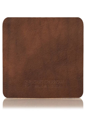 Hayez brown leather sample with Chic Sparrow logo. Square leather sample.