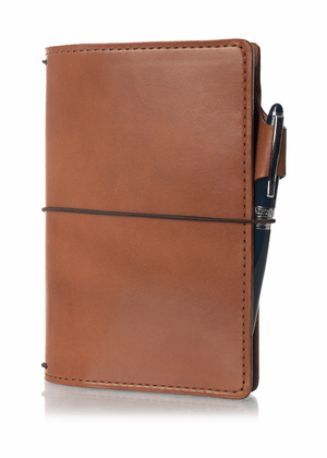 An Austen leather notebook with a closure elastic and pen loop. The collection name is Austen and the color is called Darcy (Toffee Brown) - ChicSparrow