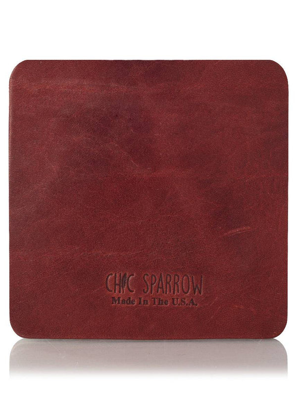Drummond burgundy leather sample with Chic Sparrow logo. Square leather sample.