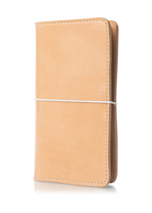 An Austen leather folio with a closure elastic. The collection name is Austen and the color is called Emma (Buff) - ChicSparrow