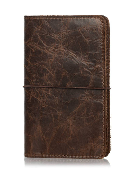 Express brown planner cover. Leather journal cover with elastic closure. 