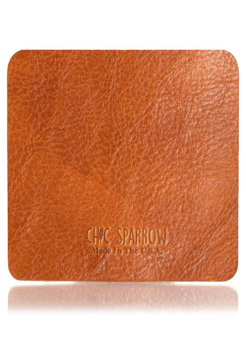 Giovanni tan leather sample with Chic Sparrow logo. Square leather sample.