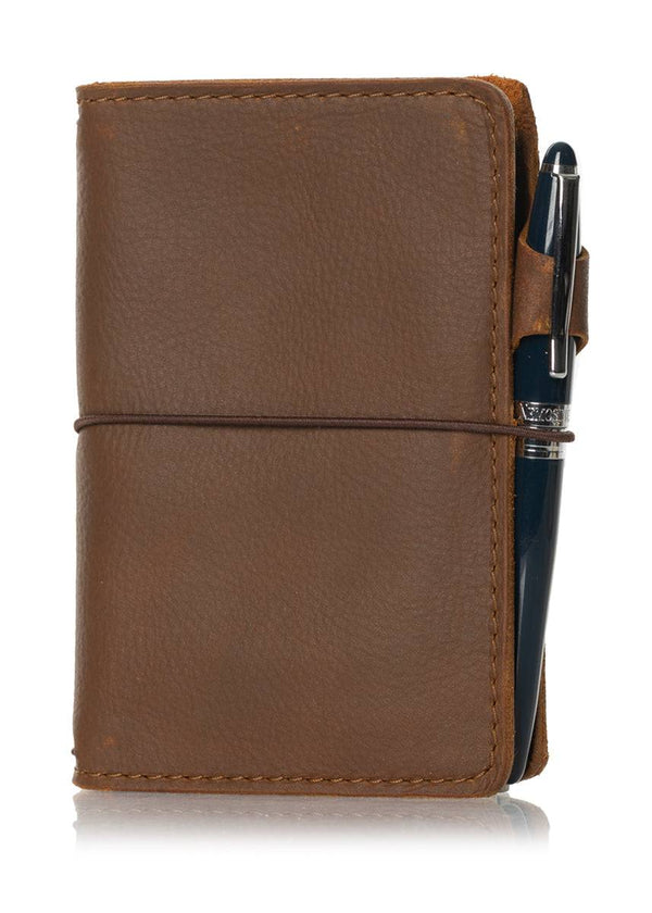 Brown leather travelers notebook cover. Brown leather journal cover with elastic closure.