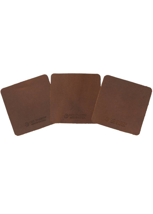 Leather samples showing variation on brown leather. Notebook cover comes in a range of brown leather colors.