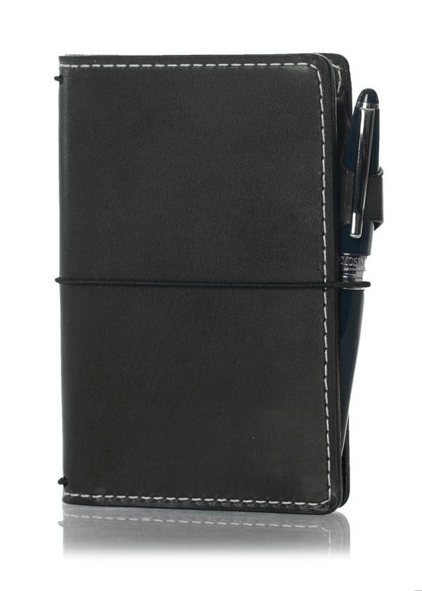 Black leather travelers notebook cover. Black leather journal cover with elastic closure.