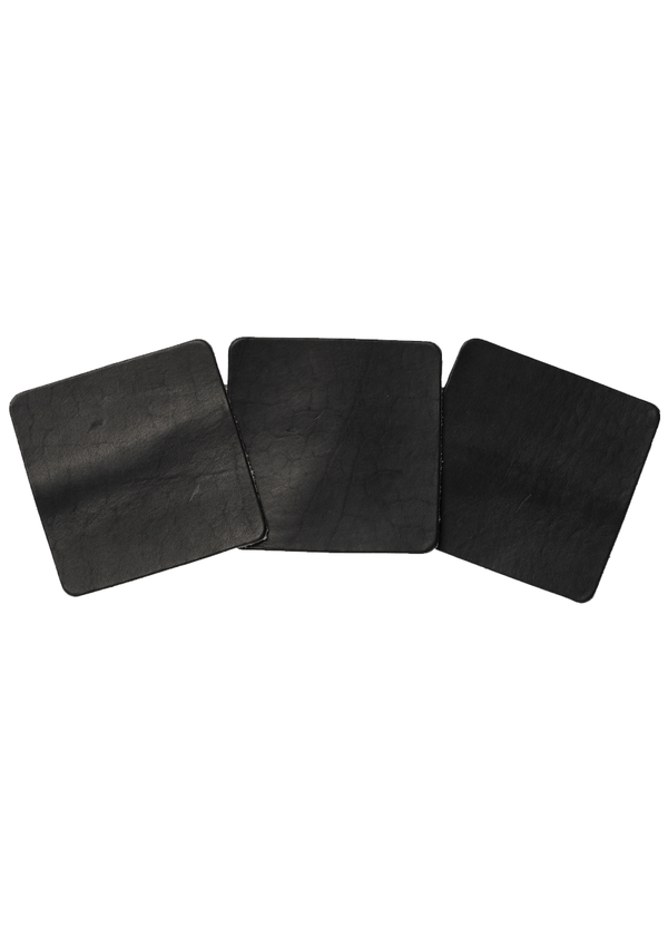 Leather samples showing variation on black leather. Notebook cover comes in a range of black leather colors.