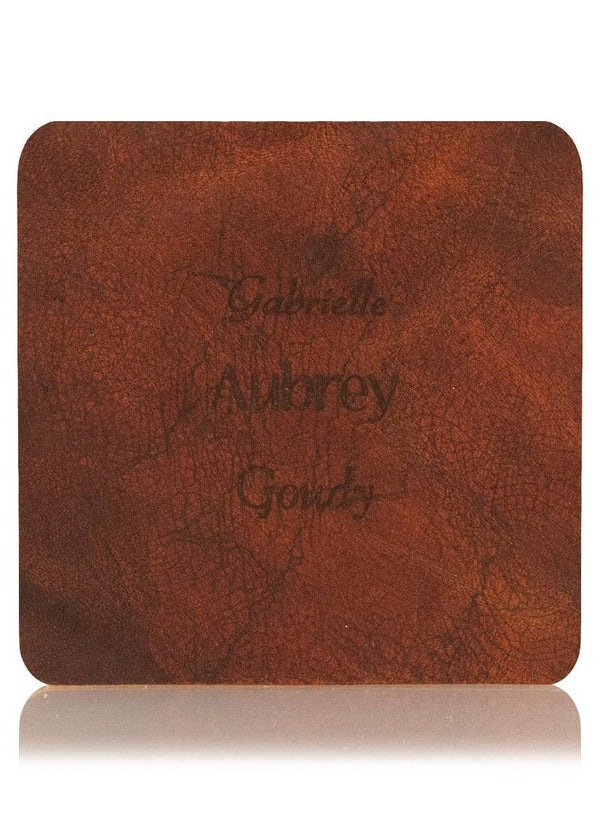Brown leather sample with inscription text. Choose from 3 different fonts to customize the leather notebook cover.
