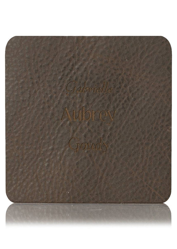 Brown leather sample with inscription text. Choose from 3 different fonts to customize the leather notebook cover.