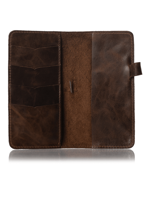 Brown leather notebook cover for Hobonichi Weeks planner. Inside cascade pockets and removable pen loop.