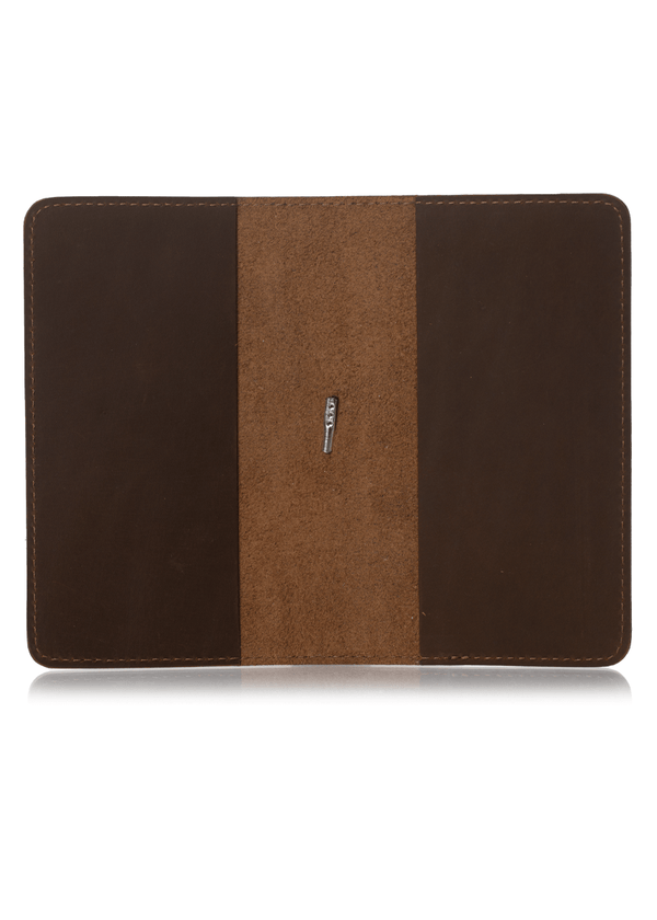 Brown planner cover interior. Leather journal cover with two pockets.