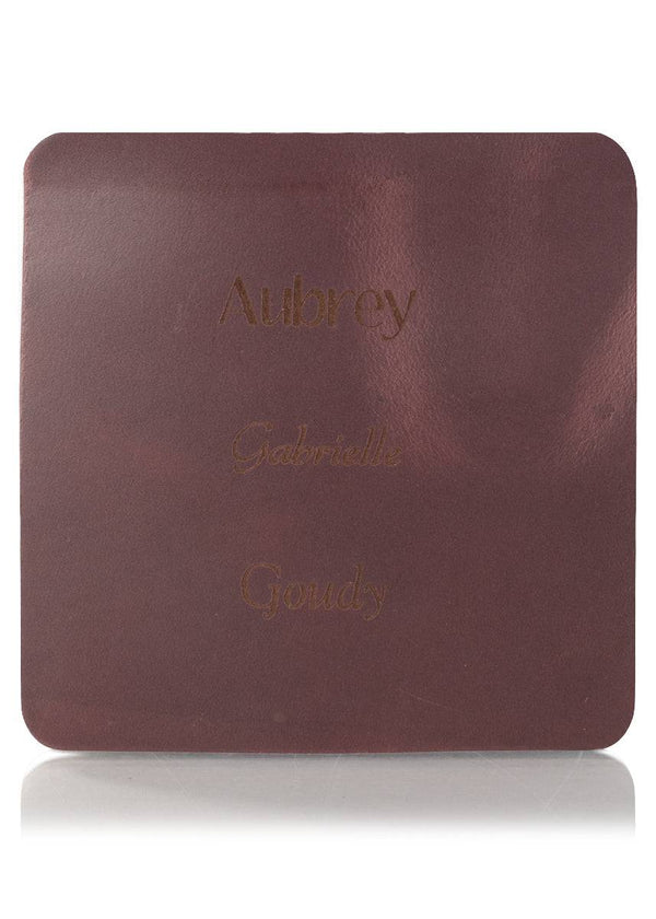 Purple leather sample with inscription text. Choose from 3 different fonts to customize the product.