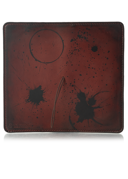 This is an example of what antiquing looks like on a Drummond. Antiquing is when an artist applies dye to make markings like splatters and cup rings on a leather notebook to make it look older. - ChicSparrow