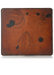 This is an example of what antiquing looks like on a Darcy. Antiquing is when an artist applies dye to make markings like splatters and cup rings on a leather notebook to make it look older. - ChicSparrow