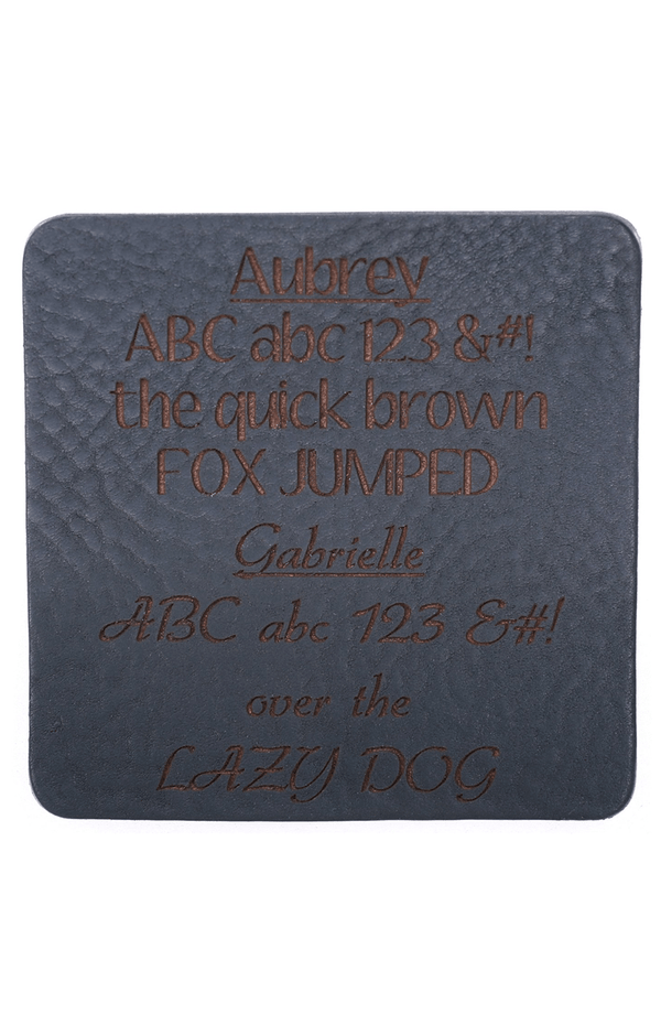 Black leather sample with inscription text. Choose from 3 different fonts to customize the leather notebook cover.