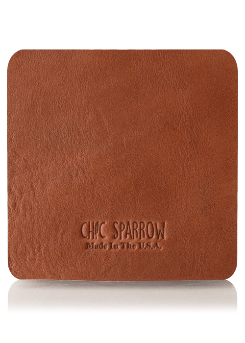 Brown leather sample with Chic Sparrow logo. Square leather sample.
