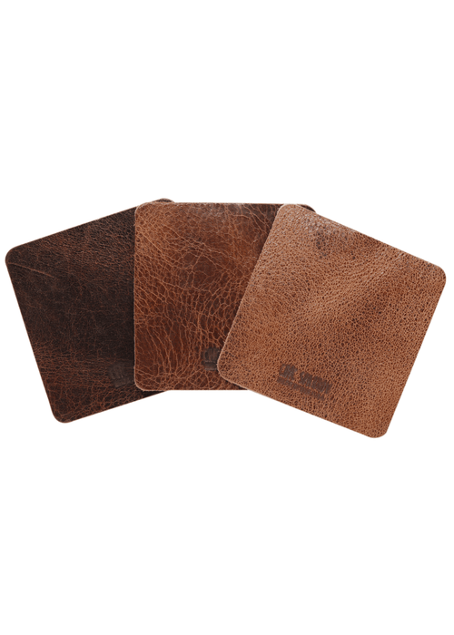 Leather samples showing variation on brown leather. Notebook cover comes in a range of brown leather colors.